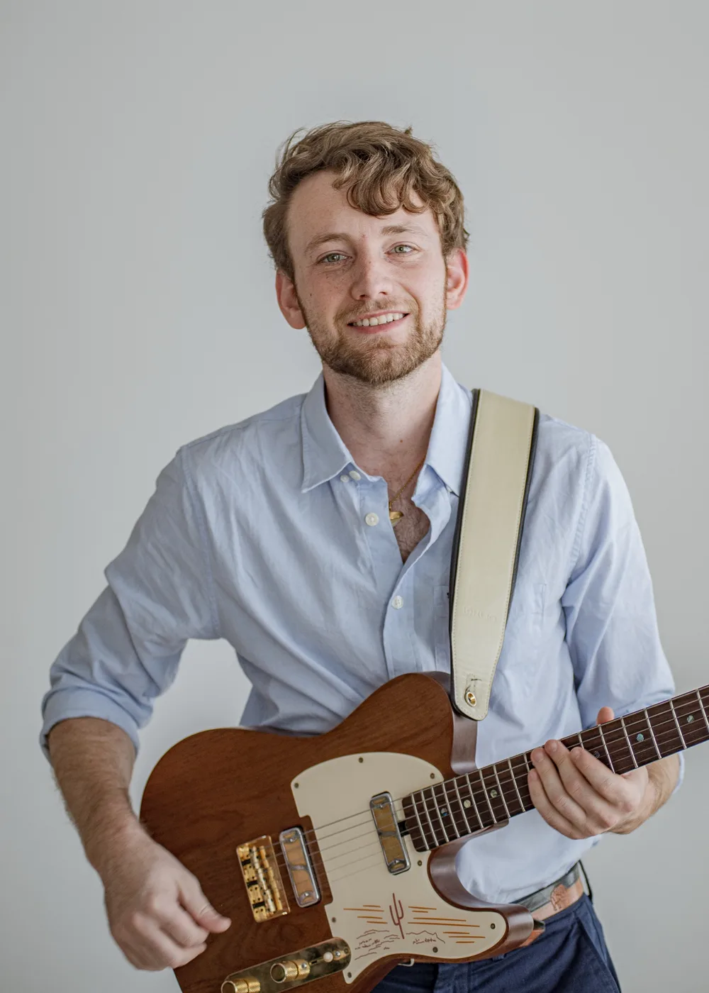 Jordan Lovinger with his guitar